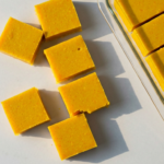 Gut-Supportive Bone Broth & Turmeric Gelatin Squares — An overhead shot of vibrant yellow-orange turmeric gelatin squares
